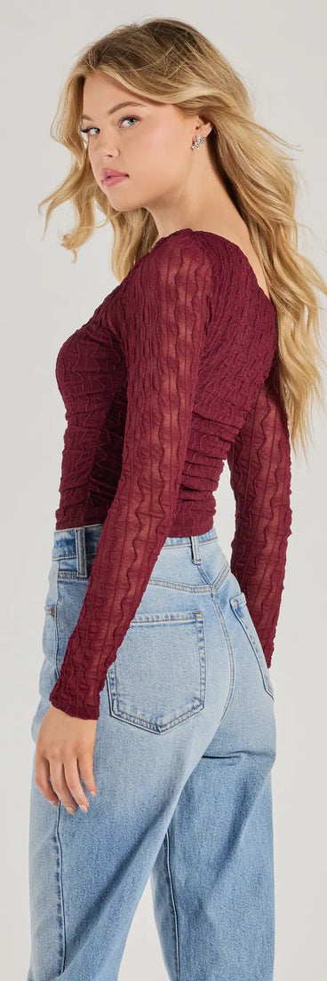 Make a statement in 2025 with the Elevated Trend Mesh Off-Shoulder Long Sleeve Top, a plum long-sleeve top featuring a trendy shoulder design that adds a bold, festive touch to any club or party look.
