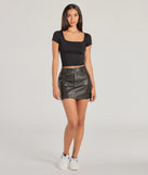 Stay on-trend this season with the The View And You Short Sleeve Tie Back Crop Top in black, a must-have for creating stylish and effortless spring outfits for women.