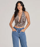 The Prowlin Around Cowl Halter Leopard Crop Top in leopard print with a modern design and trendy look is part of the latest women's tops collection to elevate your 2025 wardrobe.
