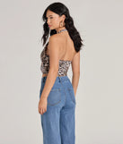 The Prowlin Around Cowl Halter Leopard Crop Top in leopard print with a modern design and trendy look is part of the latest women's tops collection to elevate your 2025 wardrobe.