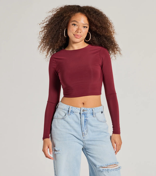 The Stop And Stare Backless Long Sleeve Top is a women's burgundy long-sleeve top with an elevated style and unique design accents, perfect for layering or transitioning into colder months.