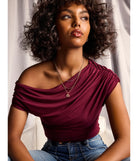 Complete your look with the Modern Chic One-Shoulder Crop Top, a trendy wine top that’s ready to pair with anything in your fall rotation.