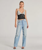 The Effortlessly Pretty Lace And Knit Sleeveless Top in black with a modern design and trendy look is part of the latest women's tops collection to elevate your 2025 wardrobe.