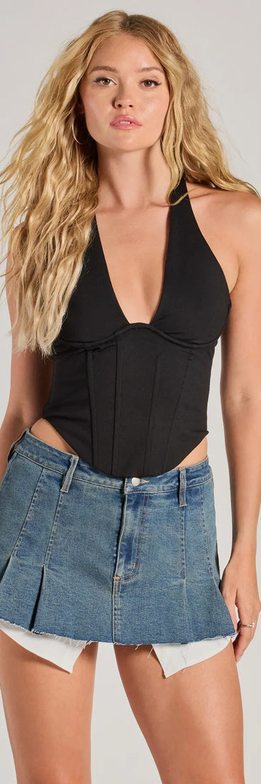 The Sleek And Stunning Corset Halter Top in black with a modern design and trendy look is part of the latest women's tops collection to elevate your 2025 wardrobe.