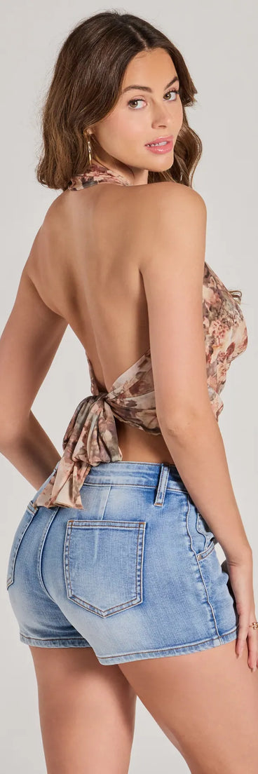The Alluring Chic Floral Mesh Halter Top in multi-color with a modern design and trendy look is part of the latest women's tops collection to elevate your 2025 wardrobe.