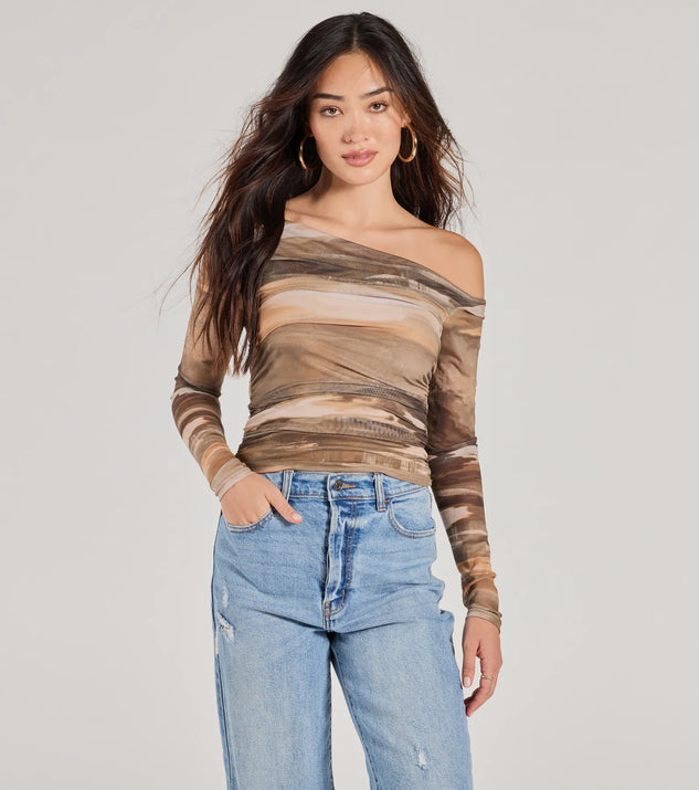 The Trendy Abstract Mesh Off-Shoulder Top in multi-color with a modern design and trendy look is part of the latest women's tops collection to elevate your 2025 wardrobe.
