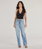The Elevated Sleek Knit Cowl Neck Halter Top in black with a modern design and trendy look is part of the latest women's tops collection to elevate your 2025 wardrobe.