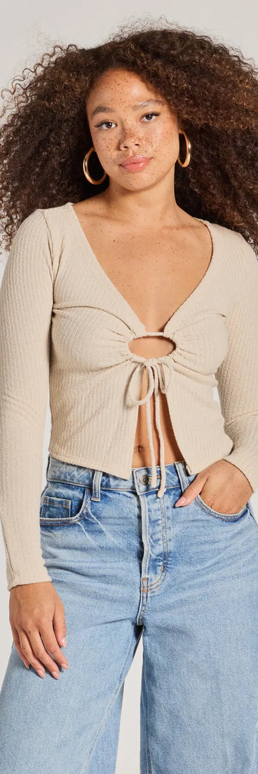 The Trendy Casual Long Sleeve Tie-Front Top in nude with a modern design and trendy look is part of the latest women's tops collection to elevate your 2025 wardrobe.
