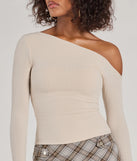 Make a statement in 2025 with the Cozy Trend Hacci Knit Off-Shoulder Long Sleeve Top, a nude long-sleeve top featuring a trendy shoulder design that adds a bold, festive touch to any club or party look.