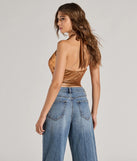 The Glam Trendsetter Metallic Knit Halter Top in gold with a modern design and trendy look is part of the latest women's tops collection to elevate your 2025 wardrobe.