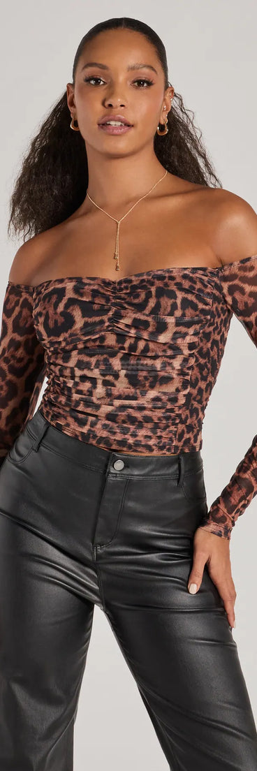 The Sultry Leopard Print Mesh Off-The-Shoulder Top in leopard print with a modern design and trendy look is part of the latest women's tops collection to elevate your 2025 wardrobe.
