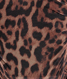 This women's leopard long-sleeve top combines seasonal color with rich texture, offering a versatile style that's perfect for on-trend 2025 outfits.