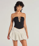 The Adorable Glam Rhinestone Bow Cutout Corset Top in black with a modern design and trendy look is part of the latest women's tops collection to elevate your 2025 wardrobe.