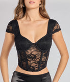 The Lace Romance Cap Sleeve Bustier in black is an elevated pick for your best outfit yet, effortlessly delivering a polished look that's sure to turn heads at any celebration.