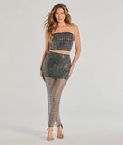 With its midriff cut and trend-forward fit, the All That Shines Rhinestone Crop Top is a black crop top made to pair with skirts, denim, or whatever vibe you're feeling this season.