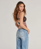 The Sultry Leopard Print Lace Bust Strappy Back Top in leopard print with a modern design and trendy look is part of the latest women's tops collection to elevate your 2025 wardrobe.