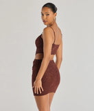 The Glowing Radiance Sleeveless Glitter Crop Top in brown with a modern design and trendy look is part of the latest women's tops collection to elevate your 2025 wardrobe.