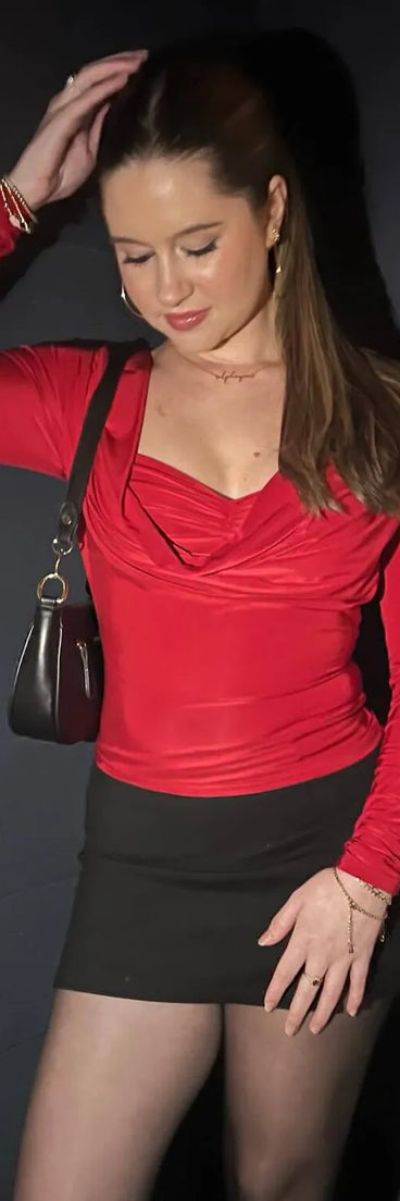 The Bringing Bold Back Long Sleeve Top in red with a modern design and trendy look is part of the latest women's tops collection to elevate your 2025 wardrobe.