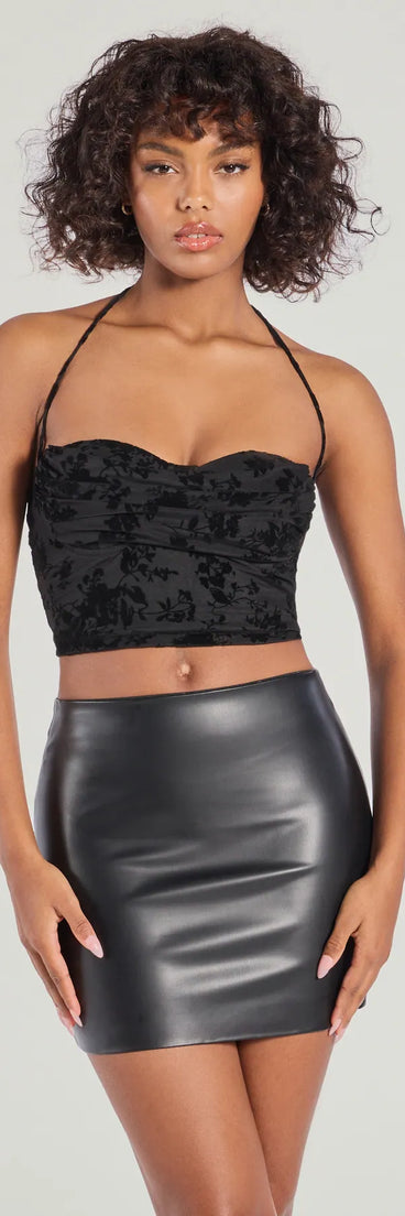 The Chic Flirt Velvet Flocked Floral Halter Bustier Top in black with a modern design and trendy look is part of the latest women's tops collection to elevate your 2025 wardrobe.