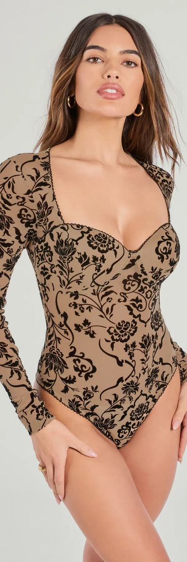 Add a sleek touch to your outfit with this nude long sleeve top—the Chic 'Fit Floral Flocked Velvet Long Sleeve Bodysuit makes effortless transitions from desk to dinner.
