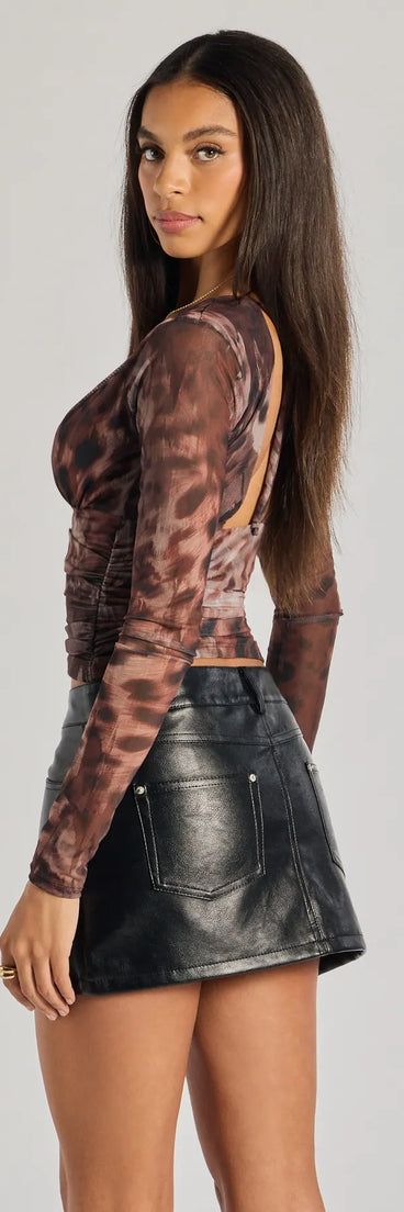 Add a sleek touch to your outfit with this multi-color long sleeve top—the Sassy Style Print Mesh Long Sleeve Top makes effortless transitions from desk to dinner.