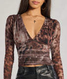 From bold to effortless, the Sassy Style Print Mesh Long Sleeve Top lets you define your vibe with multi-color tops that speak your style.