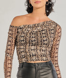 The Bold Edge Snake Print Mesh Long Sleeve Top in snake print with a modern design and trendy look is part of the latest women's tops collection to elevate your 2025 wardrobe.