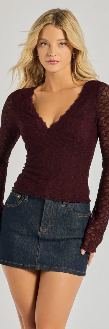 You found a burgundy going-out top that makes dressing up for the night feel effortlessly cool by creating your own vibe in the Glam Flair Long Sleeve Lace Top.