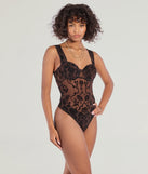 The Floral Stunner Flocked Bustier Bodysuit in brown brings sleek style to any graduation outfit, from cap and gown to after-party.