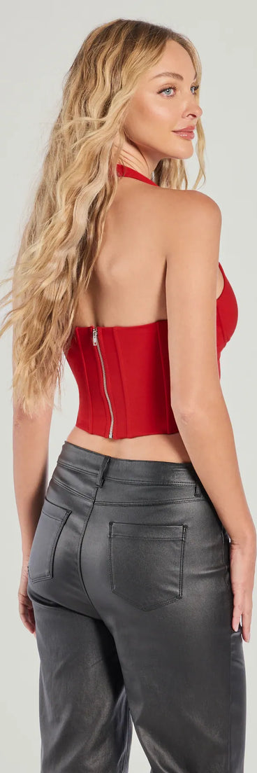 For college campus looks, game day outfits, or a bold going-out vibe, the Sleek And Stunning Corset Halter Top is an on-trend red crop top that easily styles with your favorite denim.
