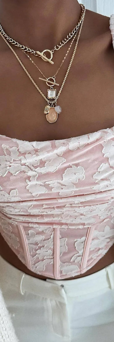 Serve effortless style and scroll-stopping energy in the Romance Me Floral Jacquard Corset Top, part of a pink matching clothing set that does the work for you with bold, polished vibes from top to bottom.