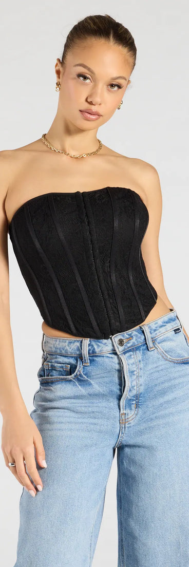 The Talk Lace Strapless Corset Top in black brings edge and energy to your vibe, ready to elevate any festival look or concert outfit.