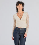 Stay on-trend this season with the Modern Romance Lace Tie-Back Crop Top in ivory, a must-have for creating stylish and effortless spring outfits for women.