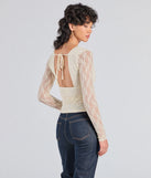 From bold to effortless, the Modern Romance Lace Tie-Back Crop Top lets you define your vibe with ivory tops that speak your style.