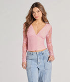 The Modern Romance Lace Tie-Back Crop Top in pink with a modern design and trendy look is part of the latest women's tops collection to elevate your 2025 wardrobe.