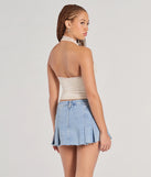 Perfect for creating a fashionable Valentine's Day outfit, the Lace Be Real Halter Satin Crop Top is a chic ivory top with romantic and modern flair, ideal for date night or Galentine’s celebrations.