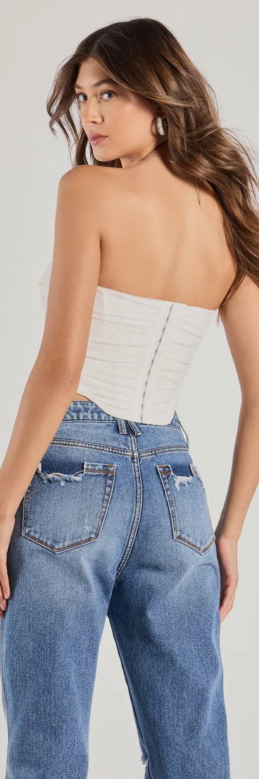 With its midriff cut and trend-forward fit, the Hit The Streets Strapless Mesh Corset Top is a ivory crop top made to pair with skirts, denim, or whatever vibe you're feeling this season.