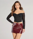 The Downtown Looks Long Sleeve Mesh Bustier in black with a modern design and trendy look is part of the latest women's tops collection to elevate your 2025 wardrobe.