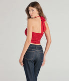 The party-ready Glitzy Chic Cropped Rhinestone Halter Top is a red going-out top showcasing a seasonal color and modern silhouette to create outfits for date nights, cocktail parties, or clubwear.