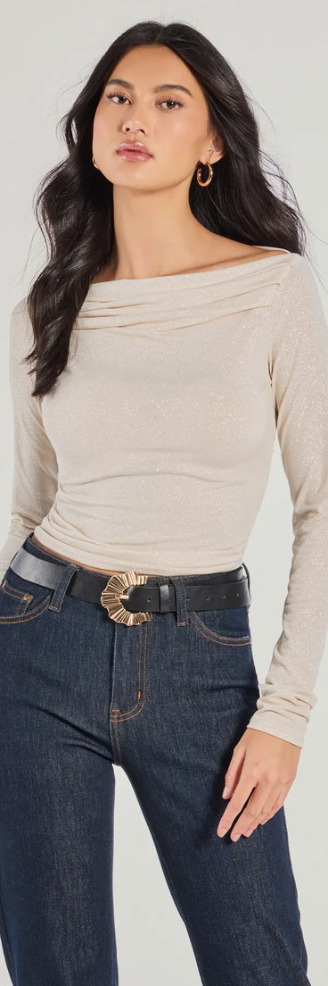 The Love To Shine Glitter Long Sleeve Top in gold with a modern design and trendy look is part of the latest women's tops collection to elevate your 2025 wardrobe.