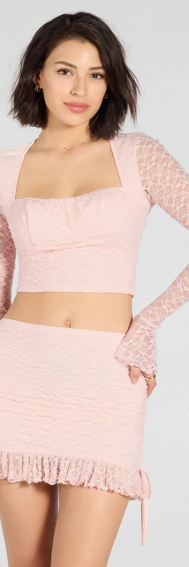 Stay on-trend this season with the Perfect Match Long Sleeve Lace Crop Top in pink, a must-have for creating stylish and effortless summer outfits for women.