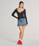 Stay on-trend this season with the Updated Basic V-Neck Long Sleeve Crop Top in black, a must-have for creating stylish and effortless spring outfits for women.