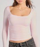 The Elevated And Cute Long Sleeve Ruched Crop Top in pink with a modern design and trendy look is part of the latest women's tops collection to elevate your 2025 wardrobe.
