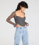 The Current Mood Lace Long Sleeve Corset Top in gray brings edge and energy to your vibe, ready to elevate any festival look or concert outfit.