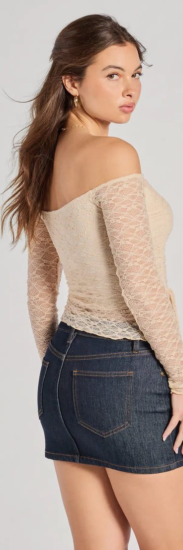 Add a sleek touch to your outfit with this ivory long sleeve top—the Trendy Babe Off-The-Shoulder Ruched Lace Top makes effortless transitions from desk to dinner.
