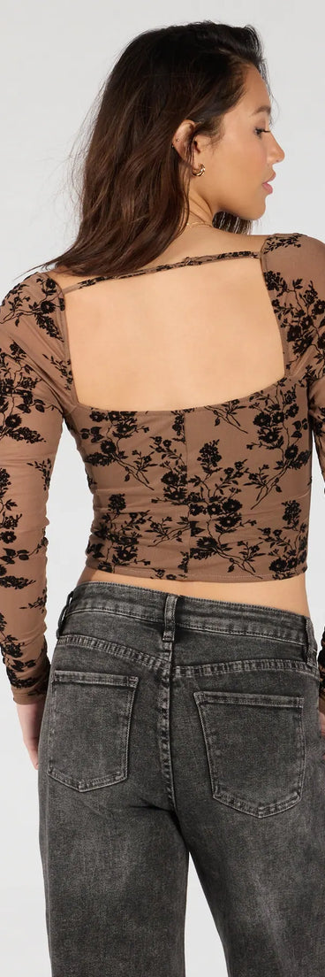 With its midriff cut and trend-forward fit, the Certified Flirt Long Sleeve Corset Crop Top is a brown crop top made to pair with skirts, denim, or whatever vibe you're feeling this season.