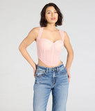 Stay on-trend this season with the Make Hearts Flutter Lace Corset Top in pink, a must-have for creating stylish and effortless spring outfits for women.