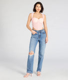 Stay on-trend this season with the Make Hearts Flutter Lace Corset Top in pink, a must-have for creating stylish and effortless spring outfits for women.