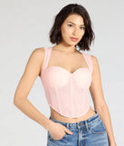 Stay on-trend this season with the Make Hearts Flutter Lace Corset Top in pink, a must-have for creating stylish and effortless spring outfits for women.