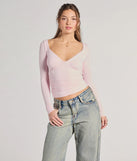 The Updated Basic V-Neck Long Sleeve Crop Top in pink with a modern design and trendy look is part of the latest women's tops collection to elevate your 2025 wardrobe.